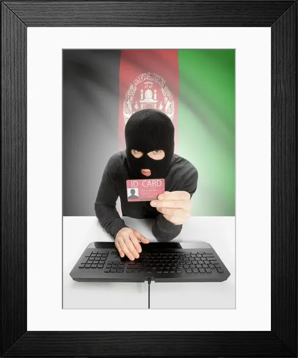 Framed Print : Hacker with ID card in hand and flag on background - Afghanistan Framed Print : Hacker with ID card in hand and flag on background - Afghanistan