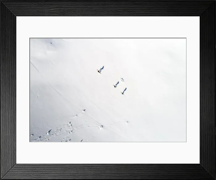 Framed Print : Aerial view of three skiers and their shadows in the Alps, Sportgastein, Salzburg, Austria