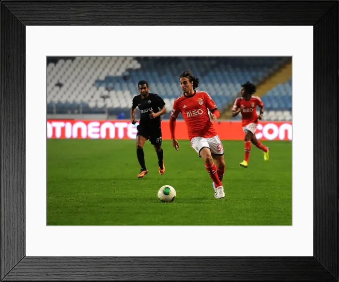 Framed Print : Serbian striker Lazar Markovic of Benfica runs with the ball during the portuguese Liga Zon Sagres football match