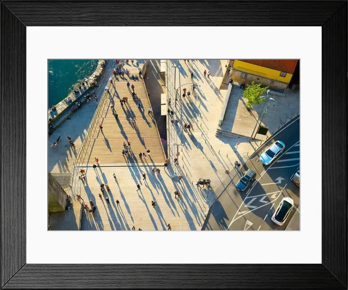 Framed Print : Aerial view of a people walking on the street at sunset Framed Print : Aerial view of a people walking on the street at sunset