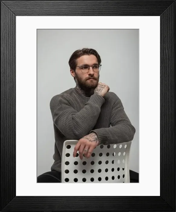 Framed Print : Stylish handsome young hipster man with glasses with hairstyle Framed Print : Stylish handsome young hipster man with glasses with hairstyle