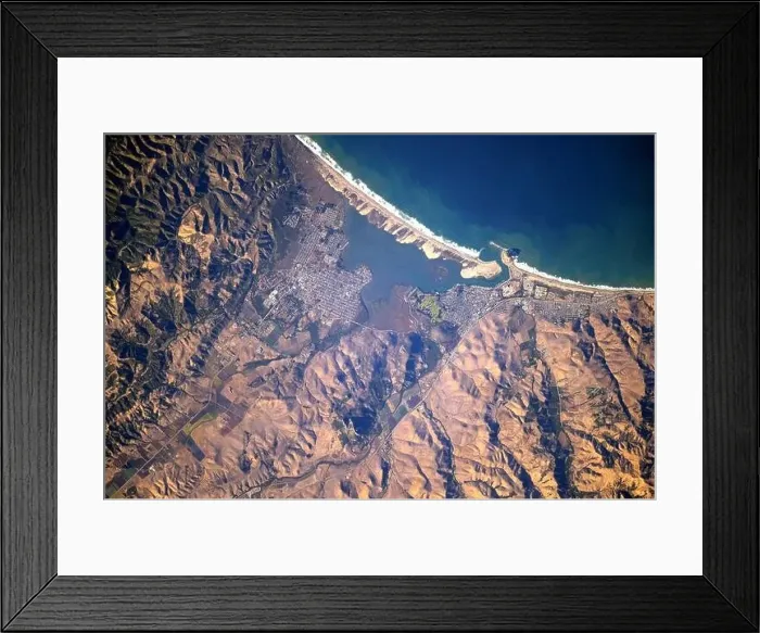 Framed Print : View from the International Space Station of the huge Morro rock as it casts a shadow on Morro Bay Framed Print : View from the International Space Station of the huge Morro rock as it casts a shadow on Morro Bay