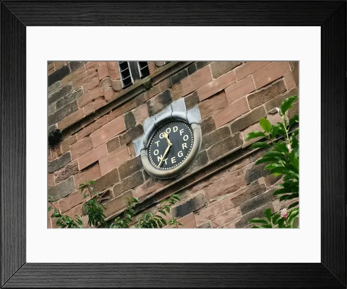 Framed Print : The clock on St Mary's Church, Cheadle Village, Stockport, Cheshire. The words on the clock say: Forget Not God Framed Print : The clock on St Mary's Church, Cheadle Village, Stockport, Cheshire. The words on the clock say: Forget Not God