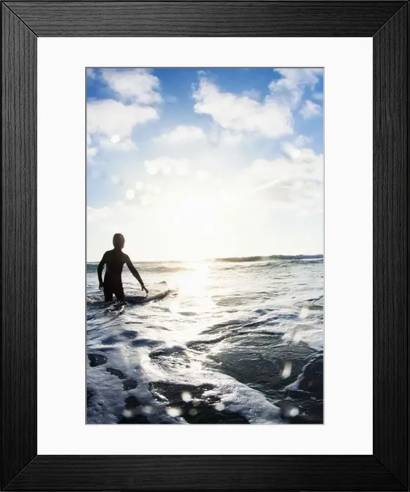 Framed Print : Boy in sea with surfboard, Encinitas, California, USA Framed Print : Boy in sea with surfboard, Encinitas, California, USA