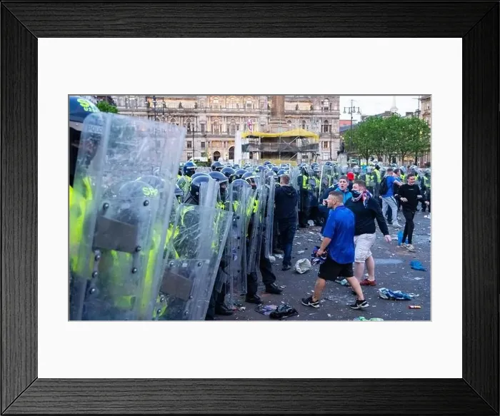Framed Print : Scenes from George Square in Glasgow following Rangers 55th league title win with riot police attempting to clear fans Framed Print : Scenes from George Square in Glasgow following Rangers 55th league title win with riot police attempting to clear fans