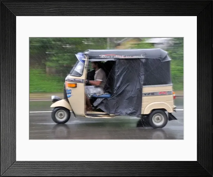 Framed Print : Three-wheeler in heavy rain, Sri Lanka Framed Print : Three-wheeler in heavy rain, Sri Lanka
