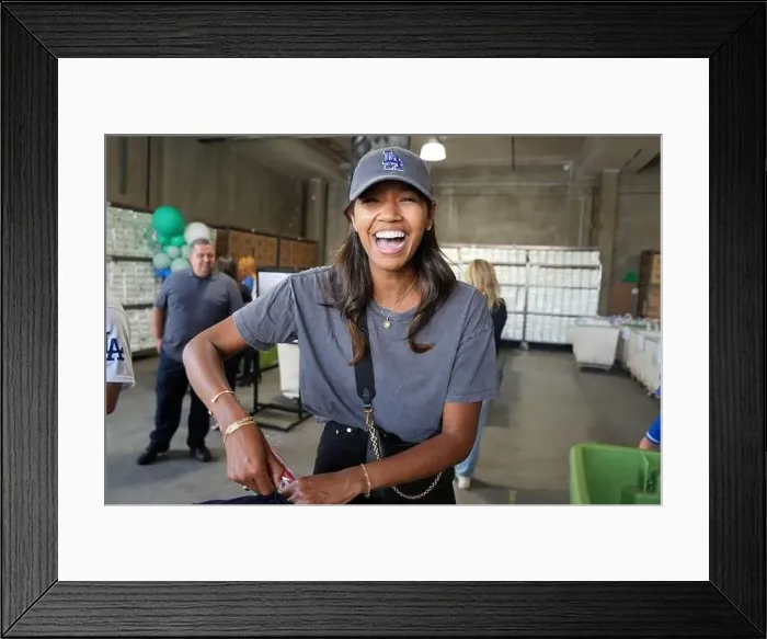 Framed Print : Spectrum SportsNetLA reporter Kirsten Watson assembles Baby2Baby basic essential kits Framed Print : Spectrum SportsNetLA reporter Kirsten Watson assembles Baby2Baby basic essential kits