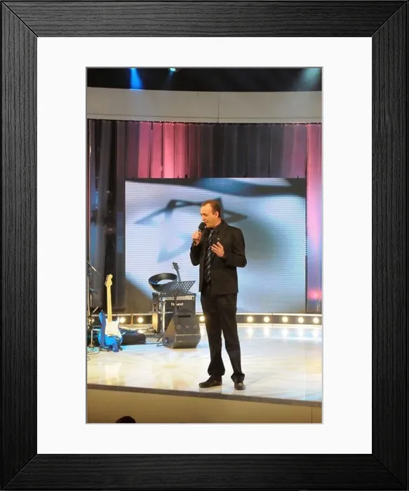 Framed Print : Israeli comedian Shalom Asayag during the recording of the Israeli TV show Laughing at work broadcasted by Reshet TV