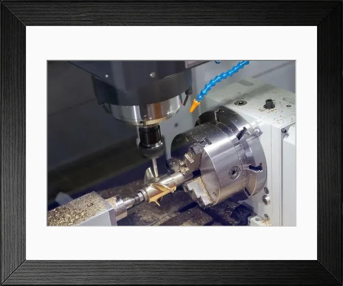 Framed Print : CNC lathe machine or Turning machine drilling the metal rod with the drill tool and center drill tool. Industry