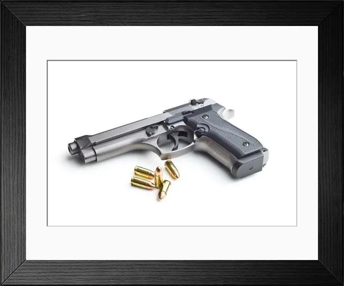 Framed Print : 9mm pistol bullets and handgun Framed Print : 9mm pistol bullets and handgun