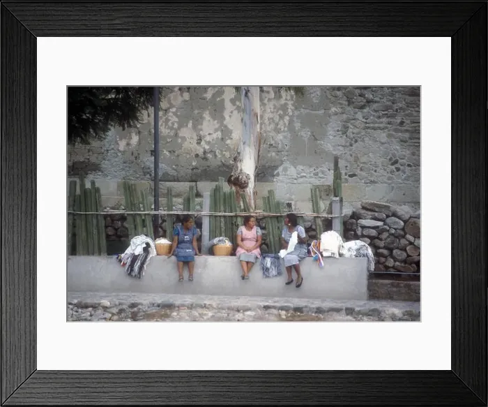 Framed Print : Zapotec indigenous women sitting on a wall chatting in the the village of Mitla, Oaxaca, Mexico Framed Print : Zapotec indigenous women sitting on a wall chatting in the the village of Mitla, Oaxaca, Mexico