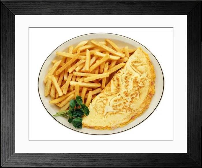Framed Print : An omelet and French fries on a plate Framed Print : An omelet and French fries on a plate