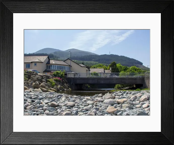 Framed Print : A view of the Mountains of Mourne from the stony beach at the mouth of the Glen River at Newcastle County Down in Framed Print : A view of the Mountains of Mourne from the stony beach at the mouth of the Glen River at Newcastle County Down in
