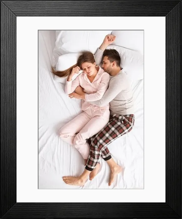 Framed Print : Young couple sleeping in bed Framed Print : Young couple sleeping in bed