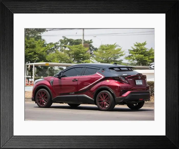 Framed Print : Chiangmai, Thailand - April 26 2019: New Toyota CHR Subcompact Crossover SUV Hybrid Car Framed Print : Chiangmai, Thailand - April 26 2019: New Toyota CHR Subcompact Crossover SUV Hybrid Car