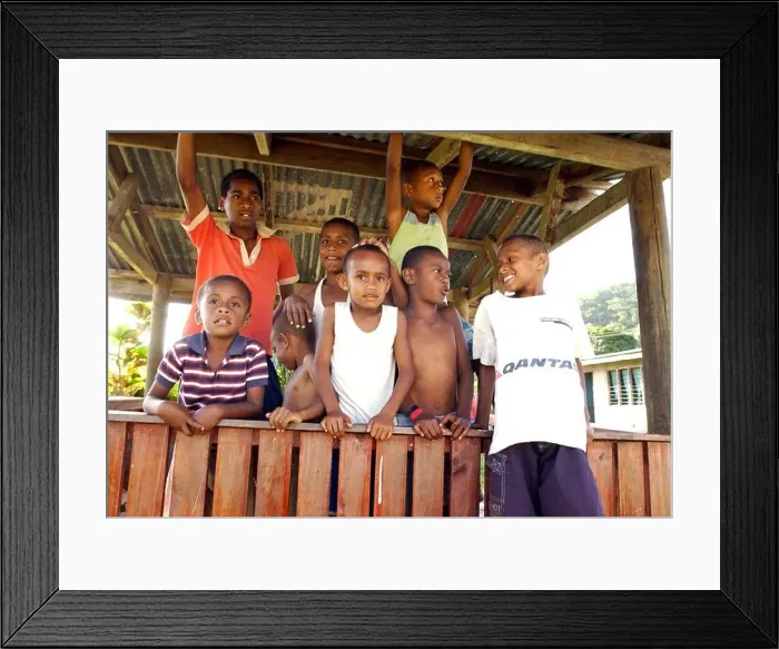 Framed Print : Local children play in the village of Korolevu on the Coral Coast Fiji Framed Print : Local children play in the village of Korolevu on the Coral Coast Fiji