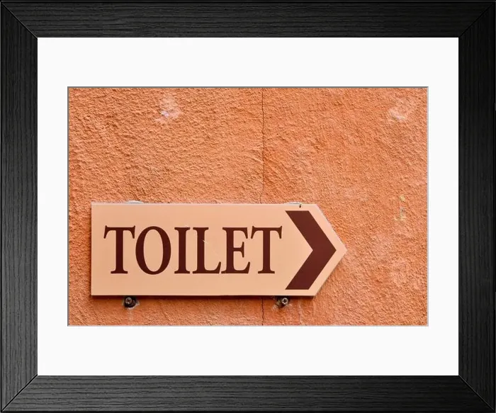 Framed Print : Toilet word, Pointing the way to the toilet Framed Print : Toilet word, Pointing the way to the toilet