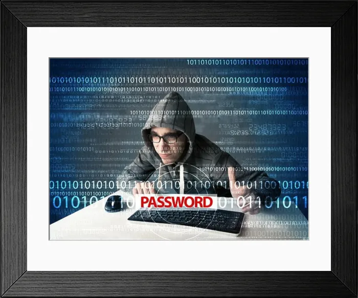 Framed Print : Young geek hacker stealing password Framed Print : Young geek hacker stealing password