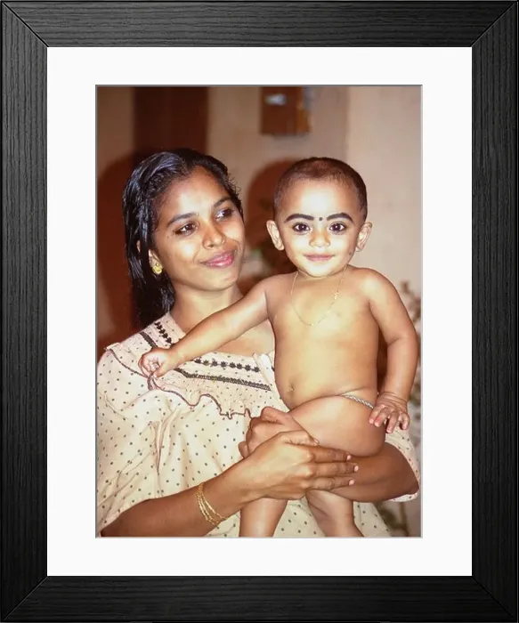 Framed Print : Portrait of a mother and child in the backwaters of Kerala, India Framed Print : Portrait of a mother and child in the backwaters of Kerala, India