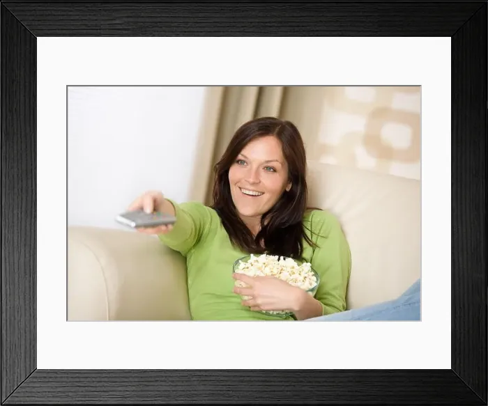 Framed Print : woman sofa television Framed Print : woman sofa television