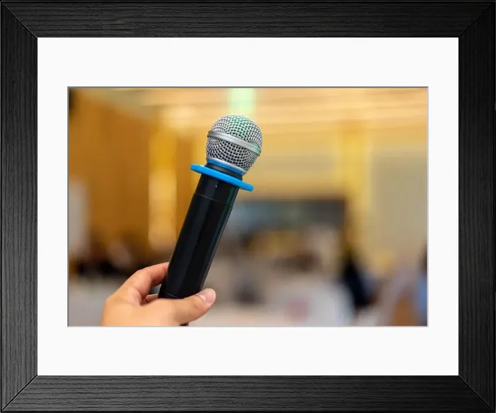 Framed Print : close up wireless mic in the seminar classroom with blur students behind Framed Print : close up wireless mic in the seminar classroom with blur students behind