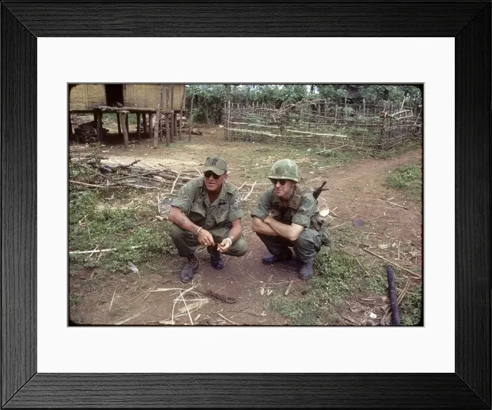 Framed Print : US soldiers squatting in village in the 4th Infantry Division's area of operations vietnam war pleiku Framed Print : US soldiers squatting in village in the 4th Infantry Division's area of operations vietnam war pleiku