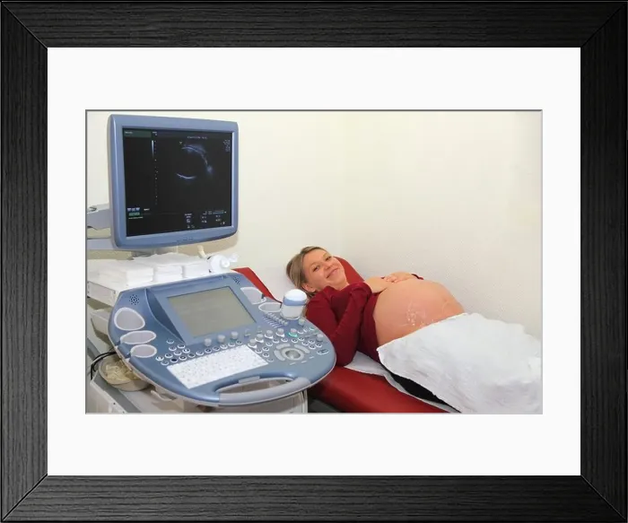 Framed Print : Pregnant woman at the ultrasonic scan examination Framed Print : Pregnant woman at the ultrasonic scan examination