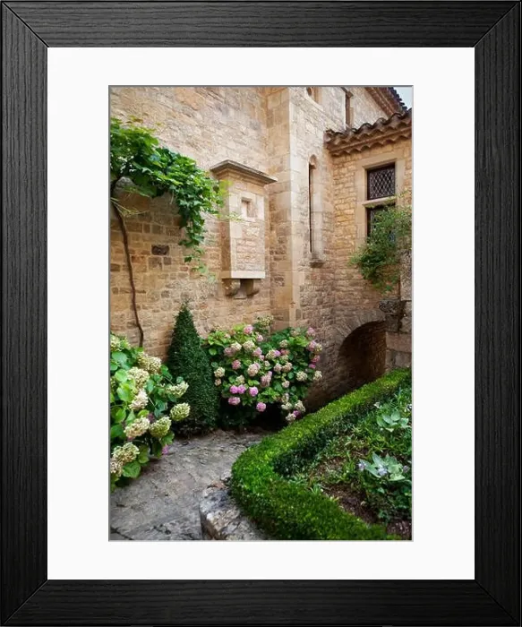Framed Print : Charming garden of an old stoned house in France Framed Print : Charming garden of an old stoned house in France