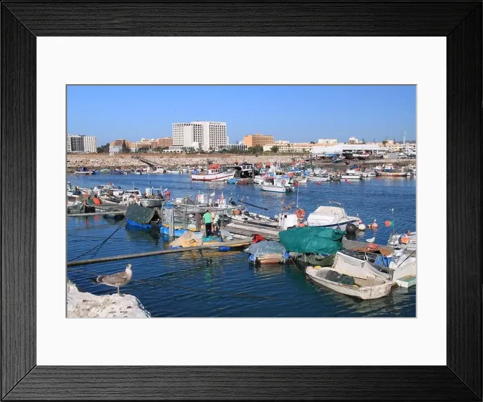 Framed Print : Quarteira fishing harbour, with Crowne Plaza beyond, Vilamoura, Algarve, Portugal, Europe Framed Print : Quarteira fishing harbour, with Crowne Plaza beyond, Vilamoura, Algarve, Portugal, Europe