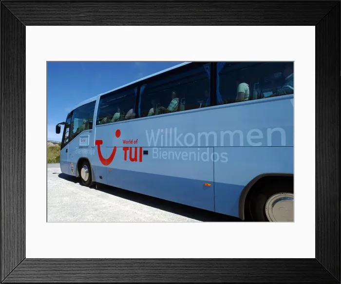 Framed Print : TUI (German tour operator) coach bus