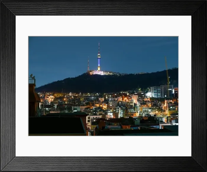 Framed Print : Itaewon district and Namsan Tower in Yongsan, Seoul, South Korea at night on February 28, 2022 Framed Print : Itaewon district and Namsan Tower in Yongsan, Seoul, South Korea at night on February 28, 2022