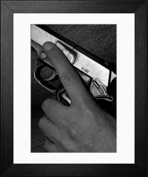 Framed Print : Teenage Hand holding a Hand Gun Framed Print : Teenage Hand holding a Hand Gun