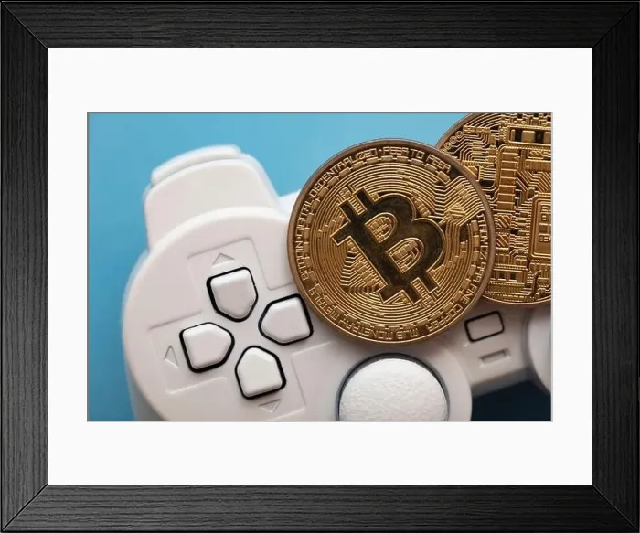 Framed Print : Crypto gaming concept. Video game controller with a bitcoin cryptocurrency coin Framed Print : Crypto gaming concept. Video game controller with a bitcoin cryptocurrency coin
