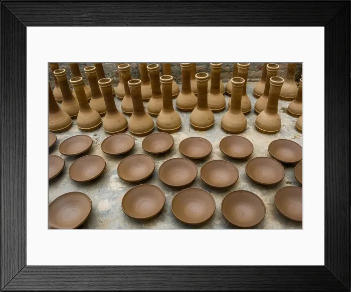 Framed Print : Earthen pots left for sundry at a workshop in the outskirts of Srinagar Framed Print : Earthen pots left for sundry at a workshop in the outskirts of Srinagar