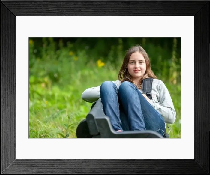 Framed Print : Young teen sat on a bench in the English countryside, Lancashire, England, UK Framed Print : Young teen sat on a bench in the English countryside, Lancashire, England, UK