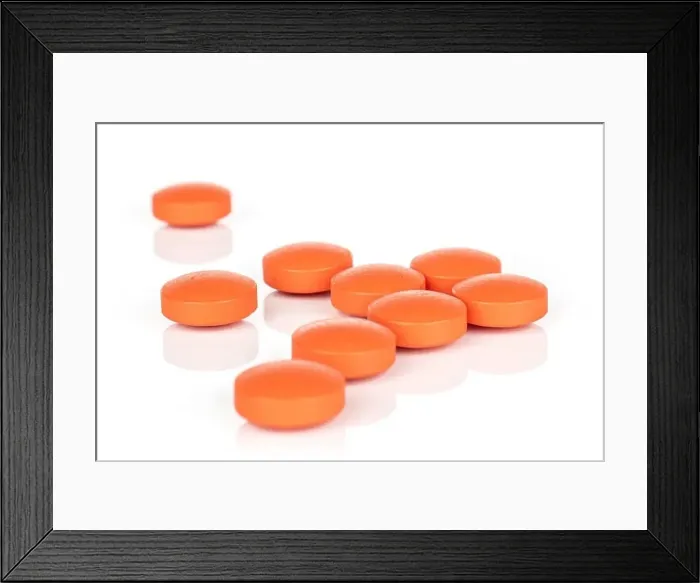 Framed Print : Group of nine whole orange tablet pharmacy isolated on white background Framed Print : Group of nine whole orange tablet pharmacy isolated on white background