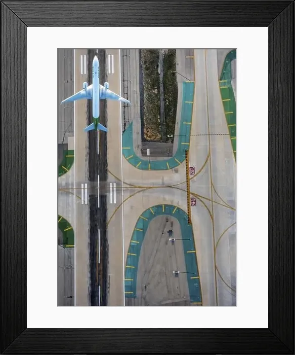 Framed Print : starting passenger jet on a runway of Los Angeles International Airport LAX in sunset in Los Angeles Framed Print : starting passenger jet on a runway of Los Angeles International Airport LAX in sunset in Los Angeles