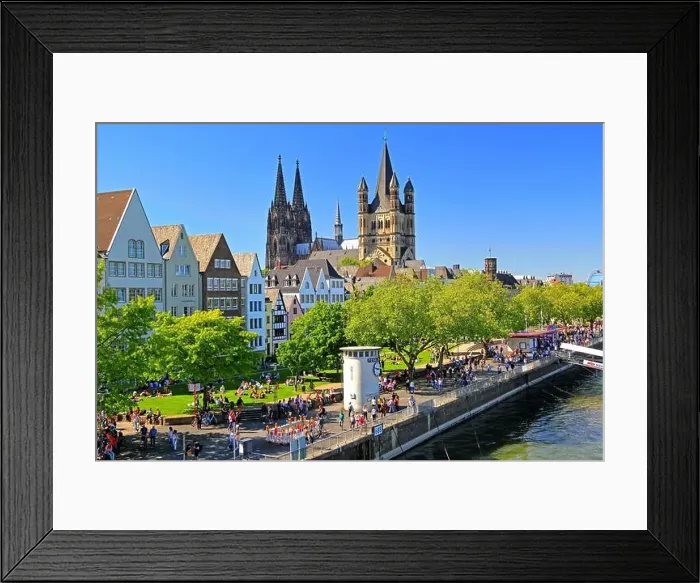 Framed Print : Rhine promenade in front of the old town with church Groß St Framed Print : Rhine promenade in front of the old town with church Groß St