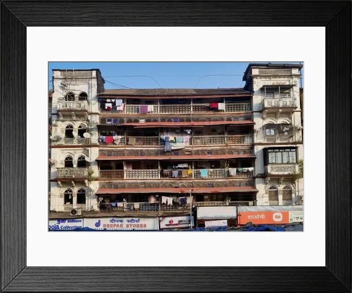 Framed Print : An old tenement building or chawl in Grant Road, Mumbai, India, with wooden balconies and laundry hanging out to dry Framed Print : An old tenement building or chawl in Grant Road, Mumbai, India, with wooden balconies and laundry hanging out to dry