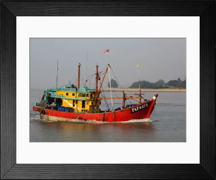 Framed Print : fishing boat entering the mouth of the Kuantan River early morning Framed Print : fishing boat entering the mouth of the Kuantan River early morning