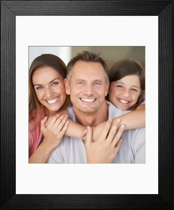 Framed Print : The best team hes ever rooted for. A young girl with her parents spending time indoors Framed Print : The best team hes ever rooted for. A young girl with her parents spending time indoors