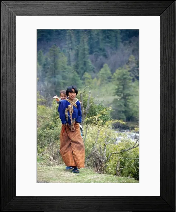 Framed Print : woman farm worker carrying baby on back. Bhutan Asia. 92064 Bhutan-Chendebi Framed Print : woman farm worker carrying baby on back. Bhutan Asia. 92064 Bhutan-Chendebi
