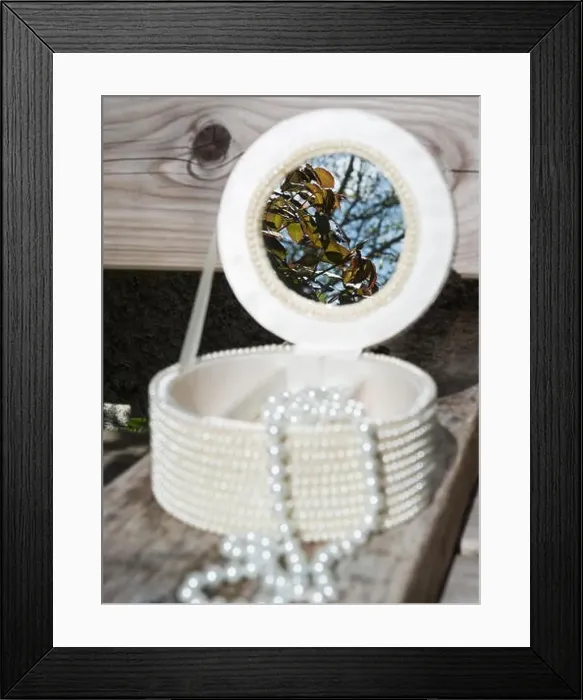 Framed Print : Jewellery box with pearls and mirror reflection of leaves Framed Print : Jewellery box with pearls and mirror reflection of leaves