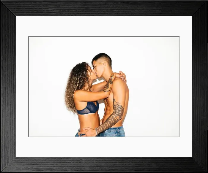 Framed Print : Passionate young couple embracing and kissing each other Framed Print : Passionate young couple embracing and kissing each other