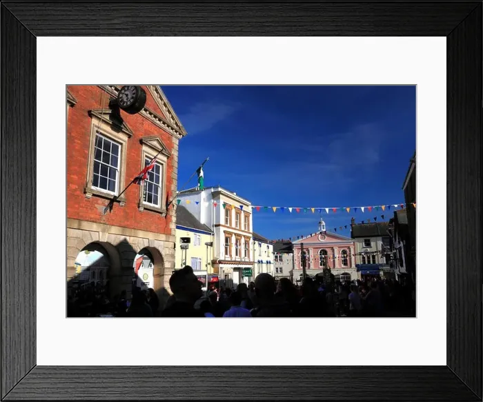 Framed Print : Great Torrington, North Devon, during the May Fair. The central pink building is the Pannier Market Framed Print : Great Torrington, North Devon, during the May Fair. The central pink building is the Pannier Market