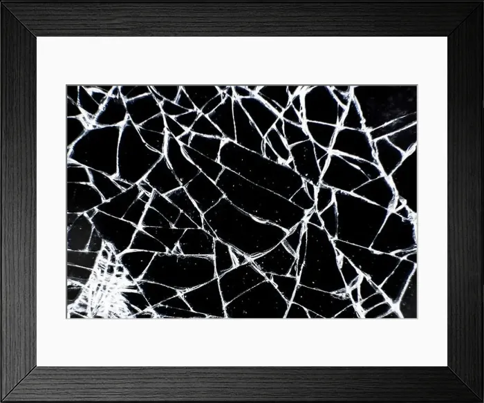 Framed Print : Broken glass tablet computer. Cracked screen. Cracks in the glass on black background Framed Print : Broken glass tablet computer. Cracked screen. Cracks in the glass on black background
