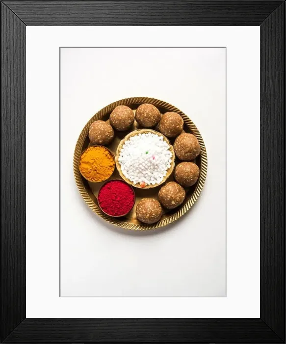 Framed Print : Tilgul or Til Gul with haldi Kumkum and halwa / chiranji or sugar balls for makar sankranti festival Framed Print : Tilgul or Til Gul with haldi Kumkum and halwa / chiranji or sugar balls for makar sankranti festival