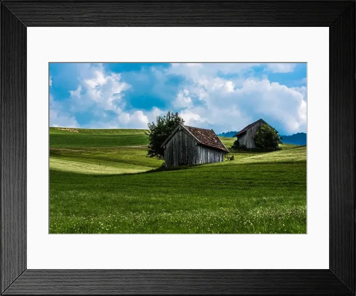 Framed Print : Scenic view over the German countryside around the village Kappel with two old wooden sheds over the green hills Framed Print : Scenic view over the German countryside around the village Kappel with two old wooden sheds over the green hills