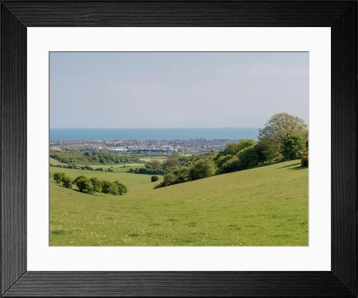 Framed Print : A view over Worthing to the sea from the South Downs National Park near to Cissbury Ring, West Sussex, UK Framed Print : A view over Worthing to the sea from the South Downs National Park near to Cissbury Ring, West Sussex, UK