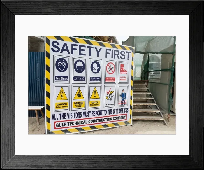 Framed Print : Signboard at construction site in Dubai with safety rules and regulations